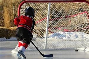 Youth Hockey Player Taking a Shot